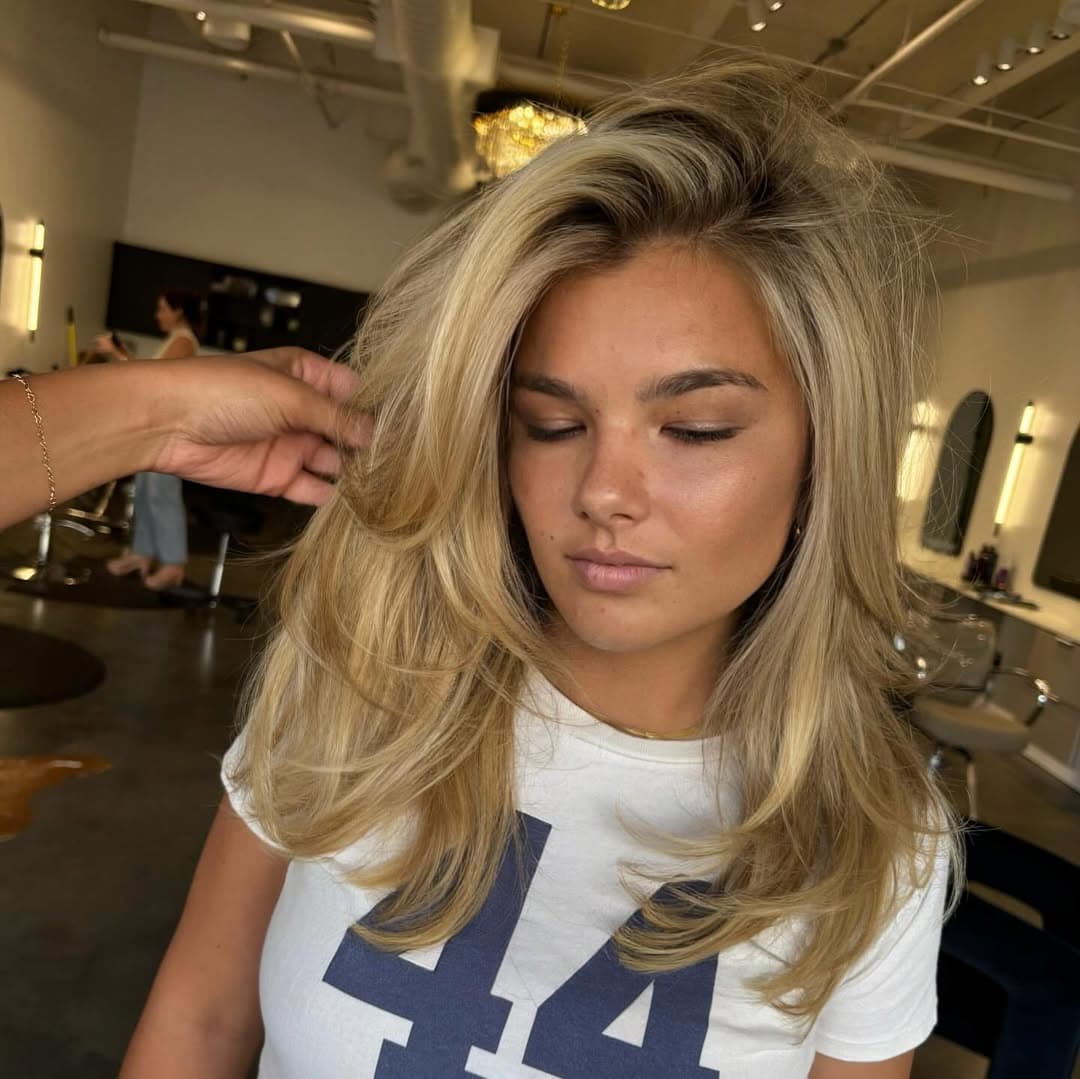 Volume and bouncy blowout styling at Volume Hair Salon