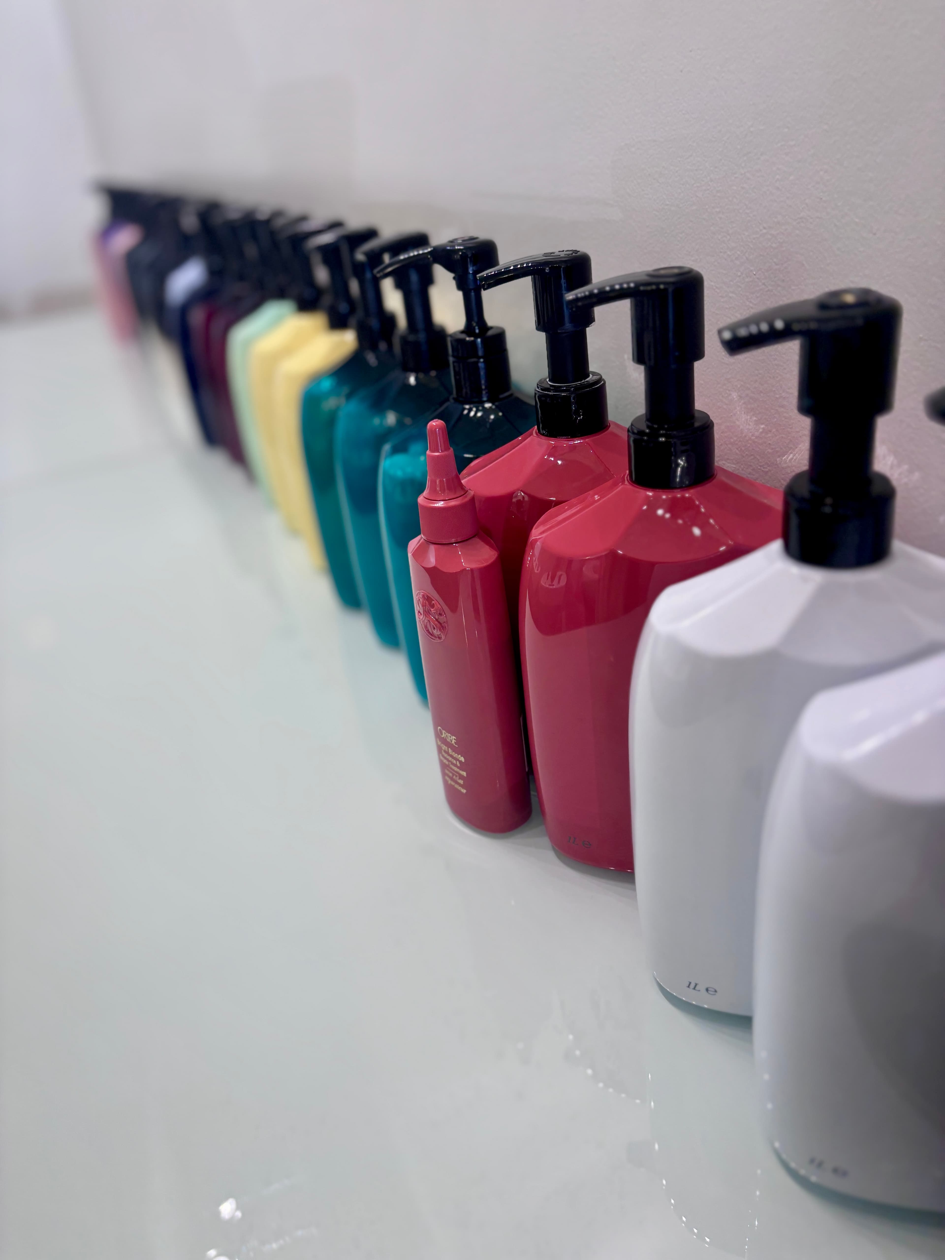 Oribe luxury hair products available at Volume Hair Salon
