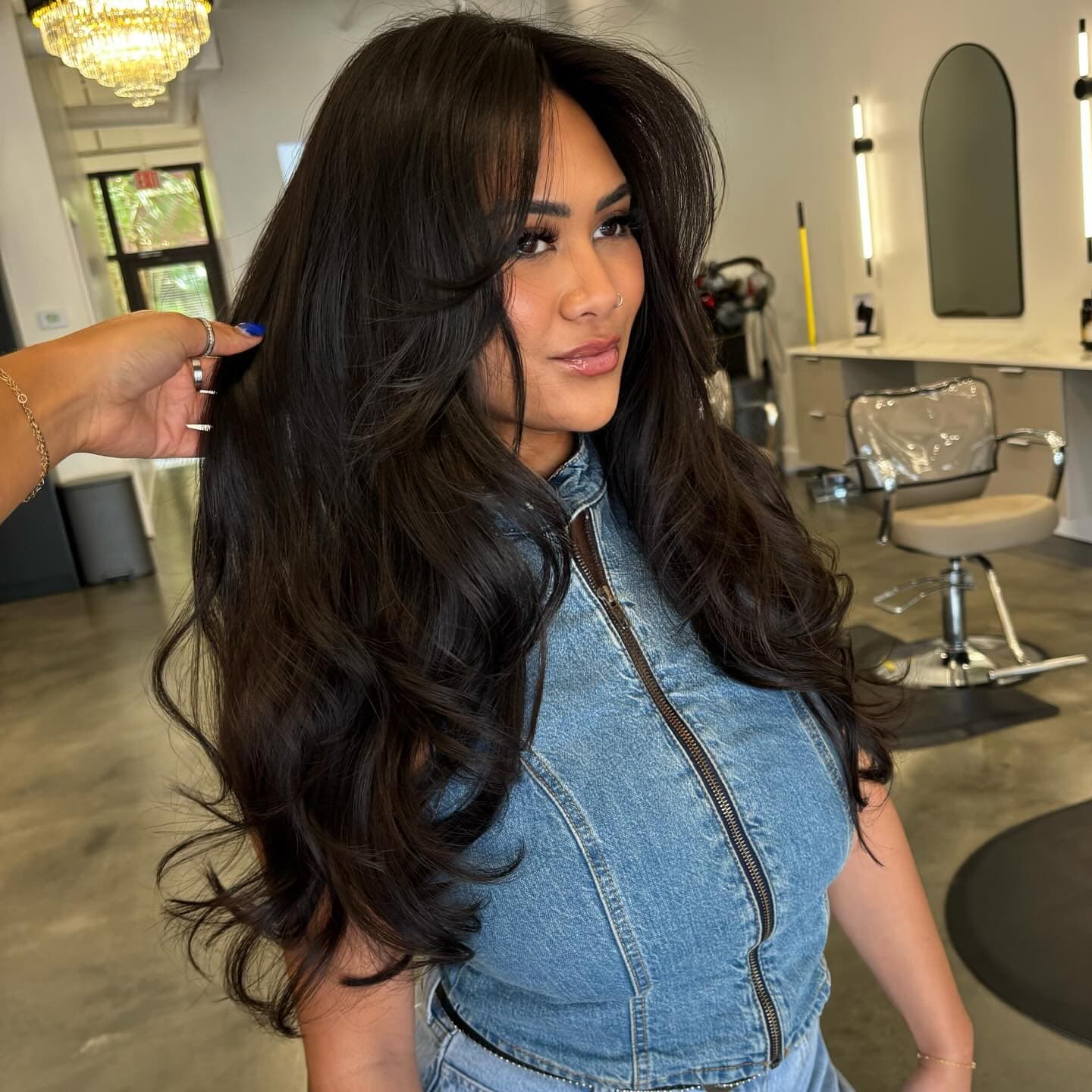 Voluminous layers with curtain bangs