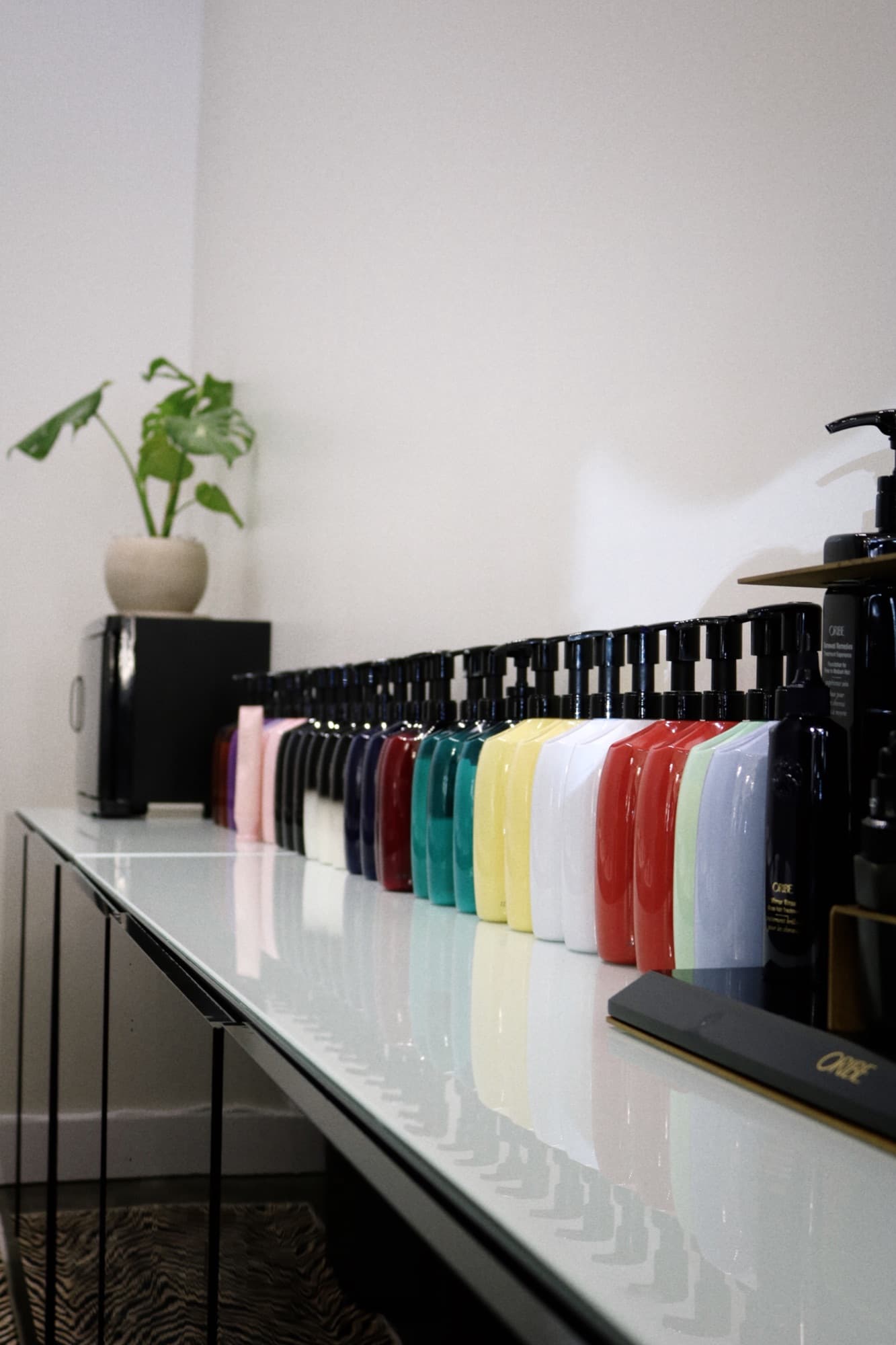 Oribe luxury hair products available at Volume Hair Salon